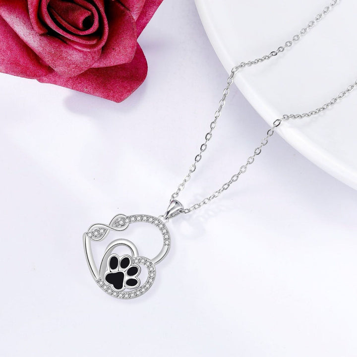 Collana con pendente a forma di doppia impronta di zampa d'amore infinito