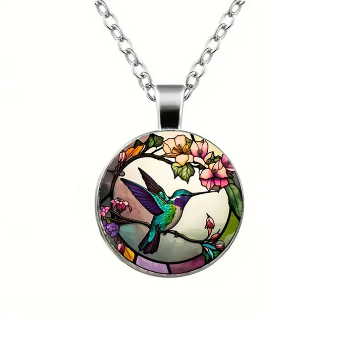 Collana con pendente a cupola in vetro con colibrì