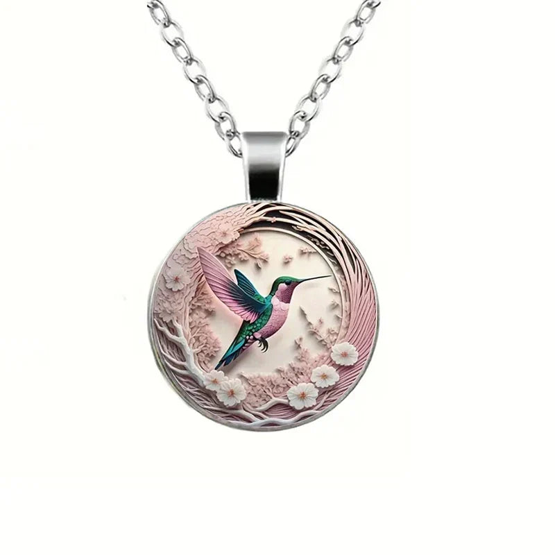 Collana con pendente a cupola in vetro con colibrì