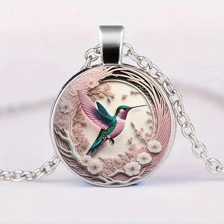 Collana con pendente a cupola in vetro con colibrì