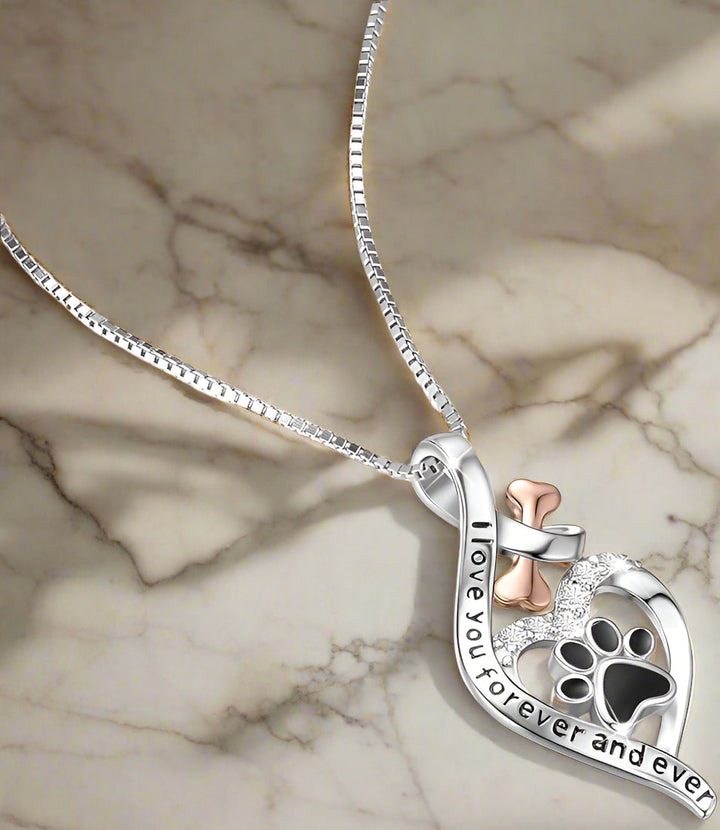 Collana Lucky Paw con cuore, osso e simbolo dell'infinito