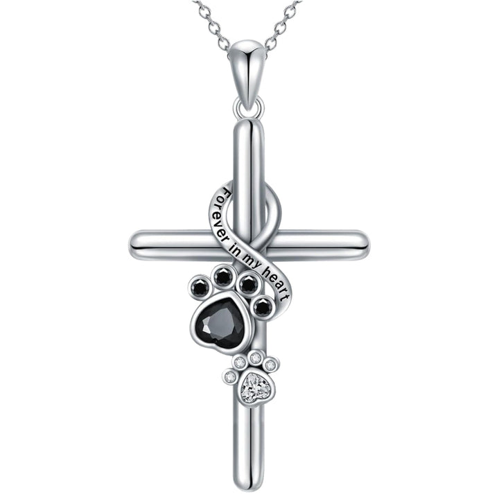 Collana con pendente a forma di zampa e croce in argento